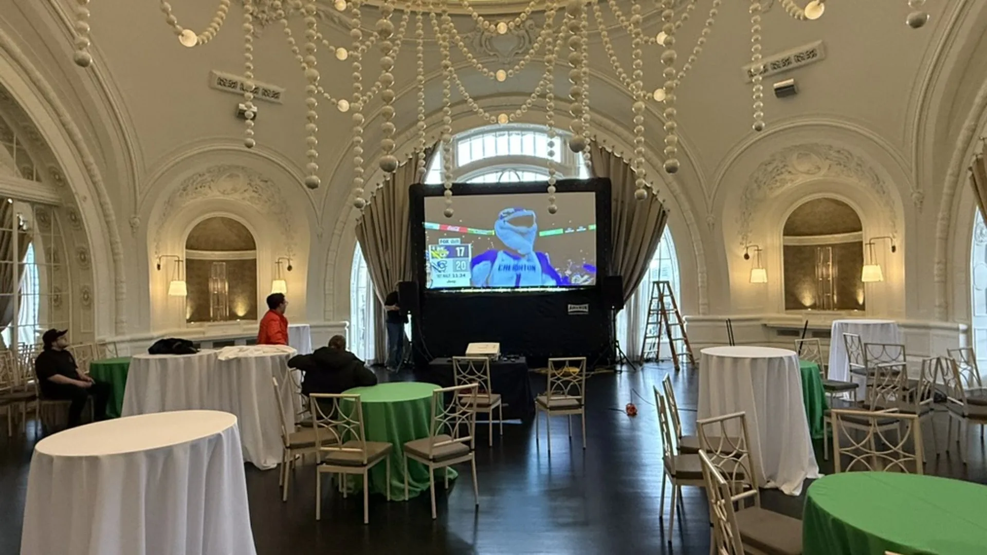 Indoor cinema event in a stunning ballroom