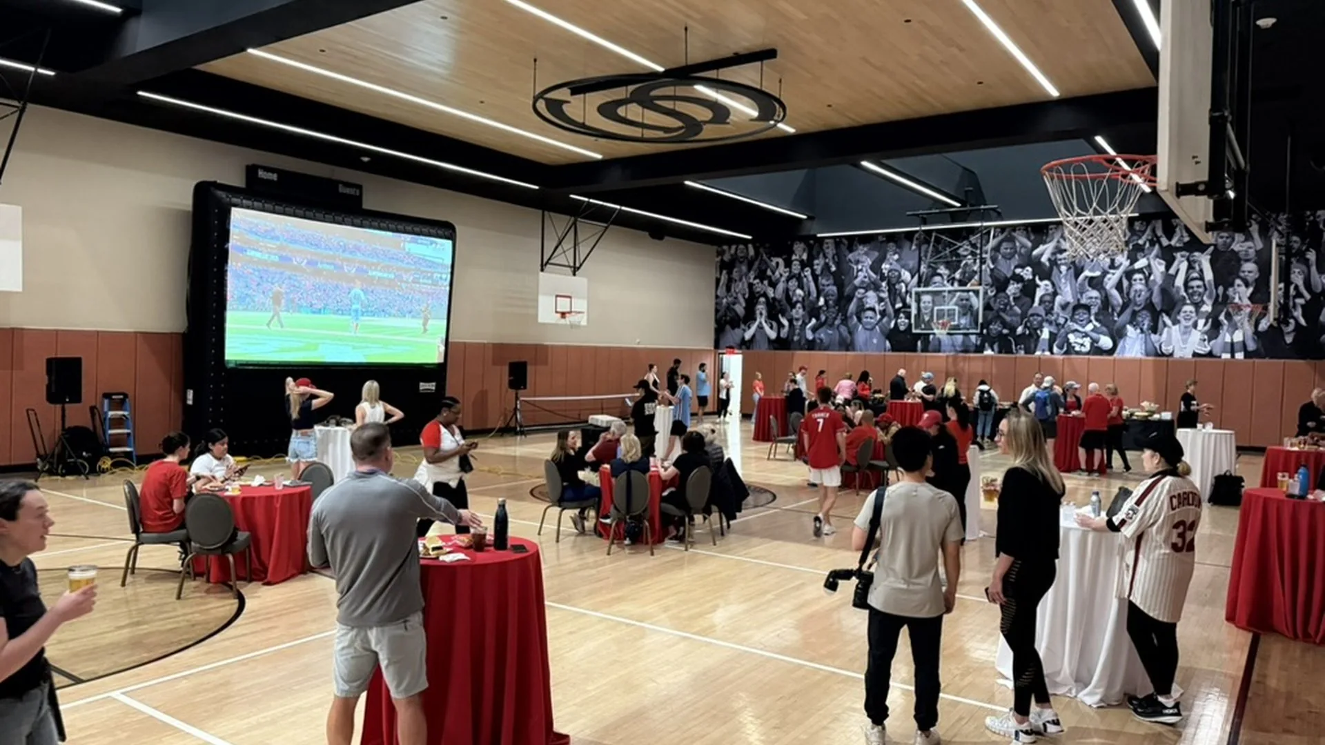 Corporate indoor movie event in a gymnasium